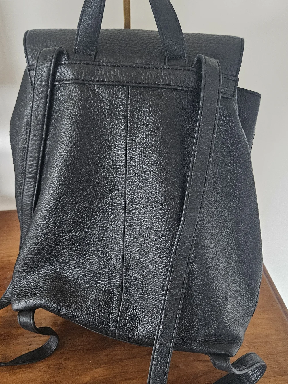 kate spade Black Pebbled Leather Backpack with Tassels